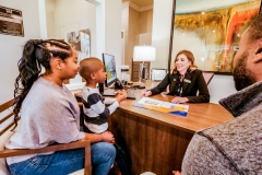 P1088438_Leasing-Agent-at-Desk_Prospect-Family