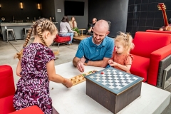 P1155646_Dad-Kids-playing-Games_Socializing-in-BG