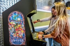 P1166199_Women-Playing-Arcade-Game